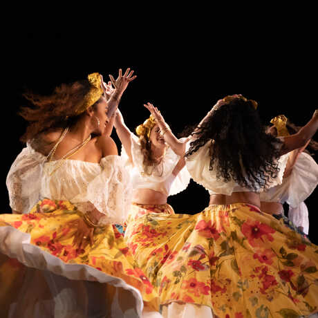 Brasarte dancers twirling in skirts
